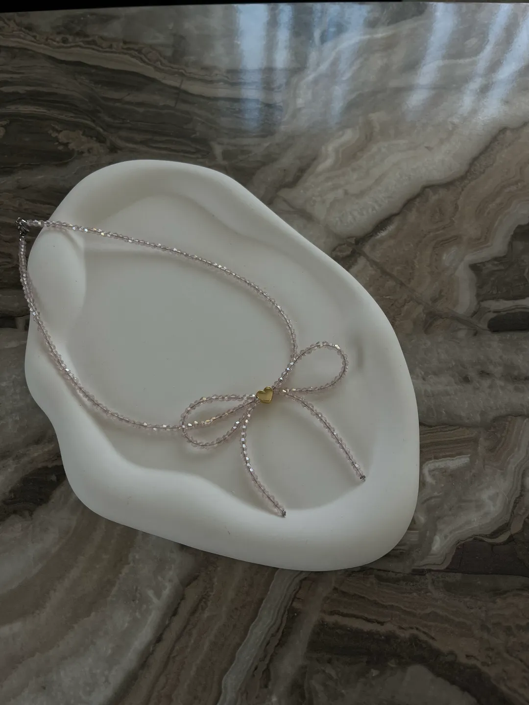 Choker in the form of a pink bow