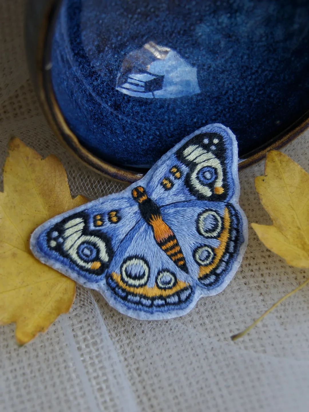 Butterfly Brooch. Embroidered pin brooch. A brooch in the shape of a butterfly.