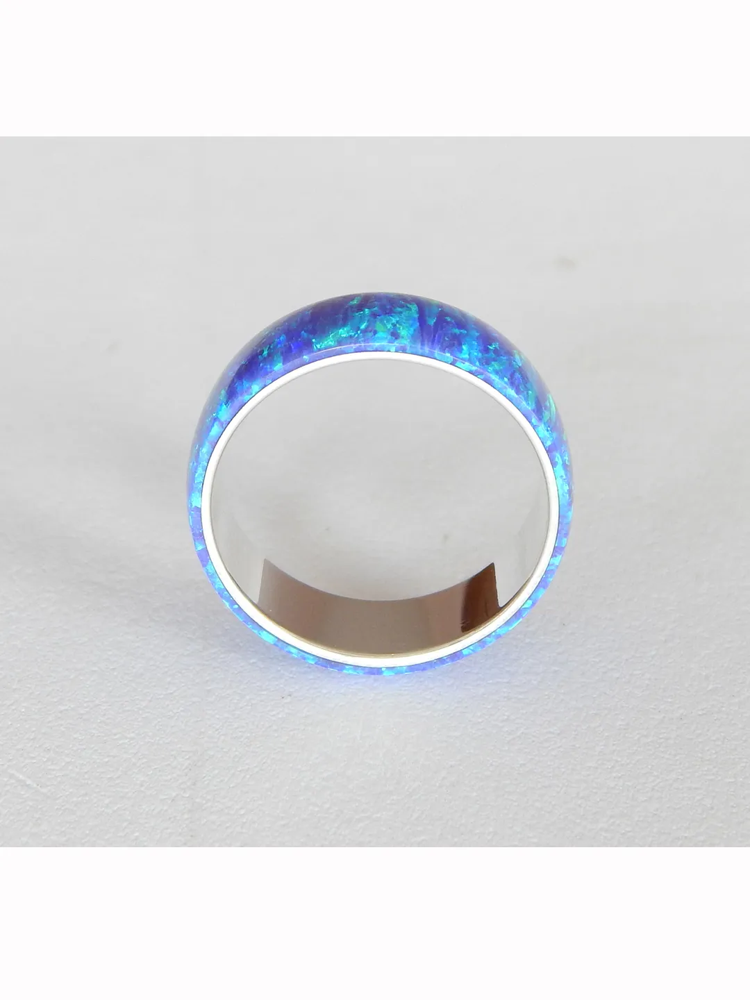 Silver band ring. Silver ring with synthetic opal.