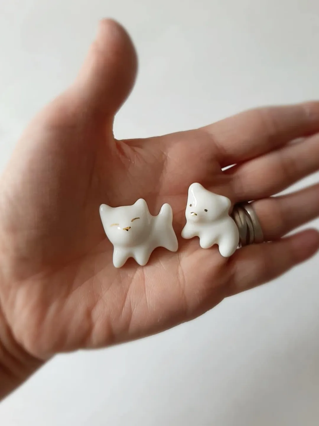 Brooch. Cat and bear