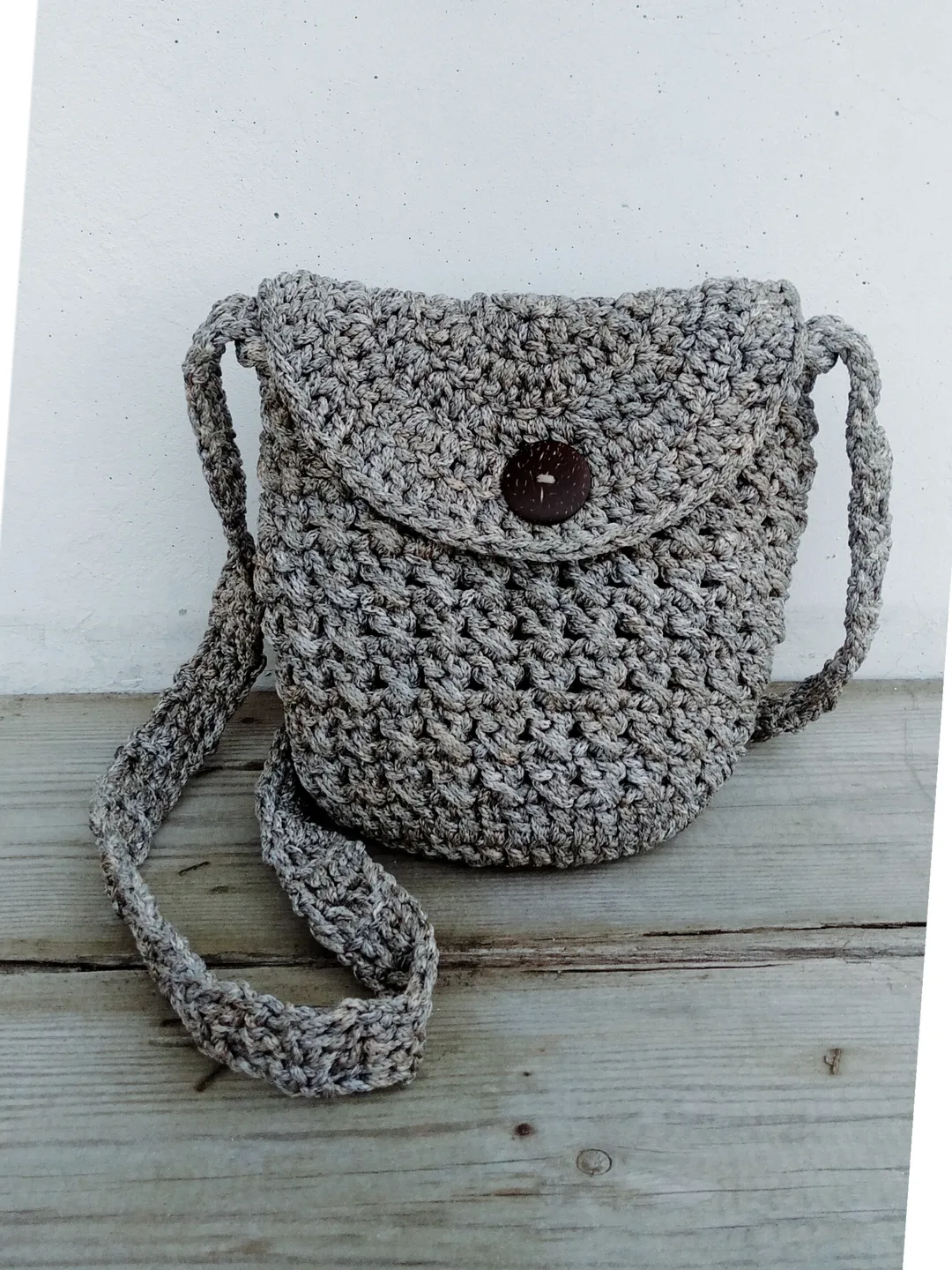 Gray knitted bag.