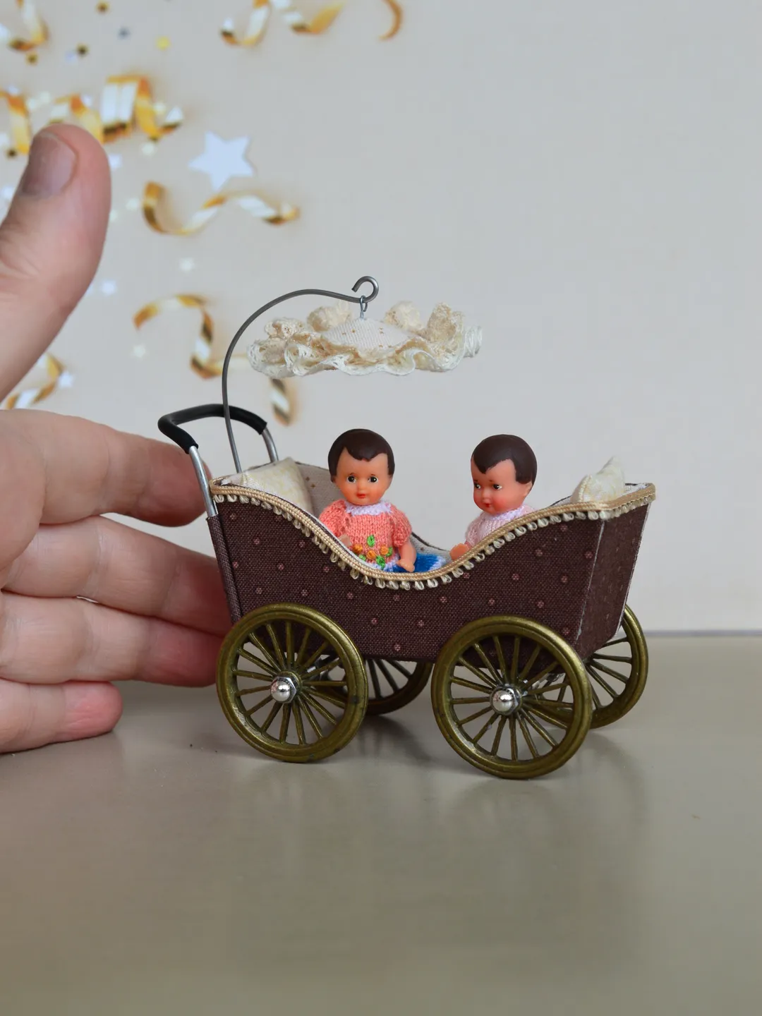Miniature toy stroller for two small dolls. Handmade miniature stroller for small dolls.