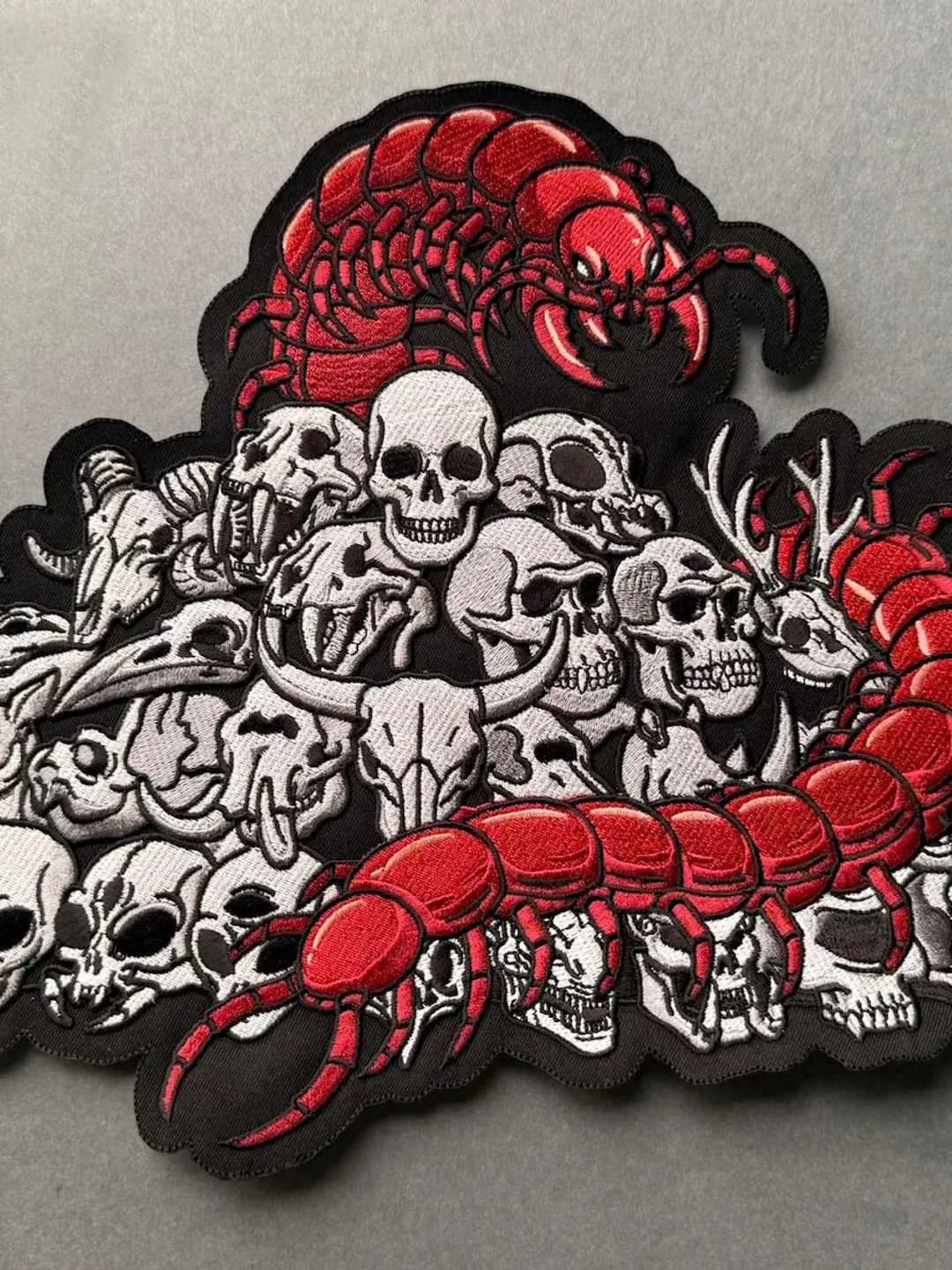 Scavenger's Daughter back patch, measuring approximately 10x13 inches and inspired by Dungeon Crawler Carl