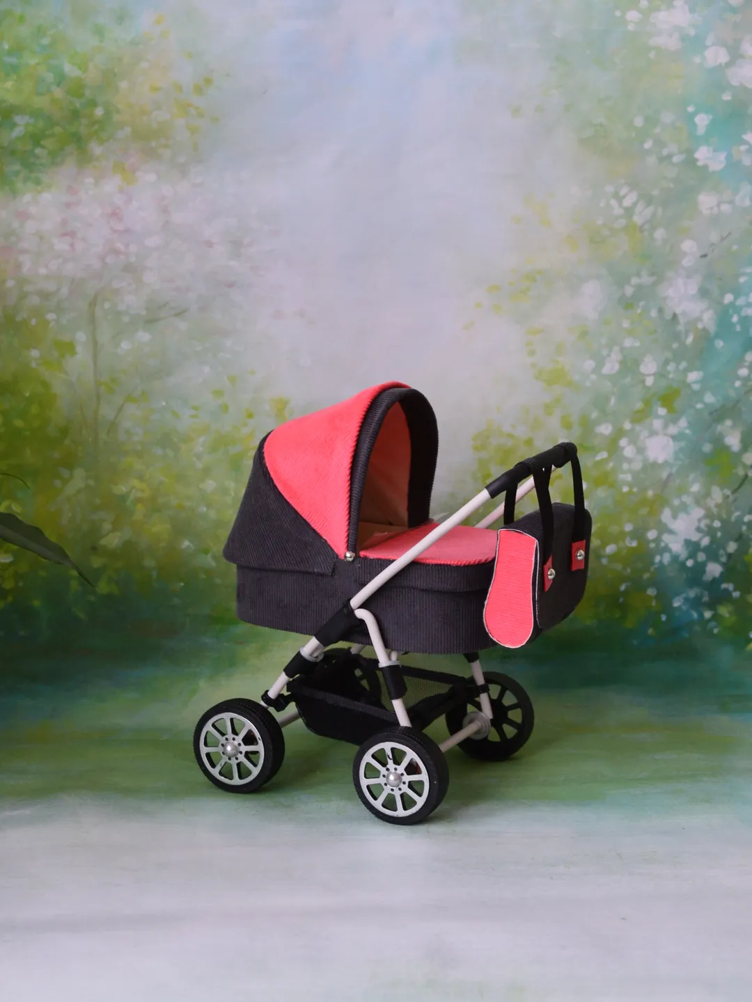 Miniature toy stroller for Barbie dolls.