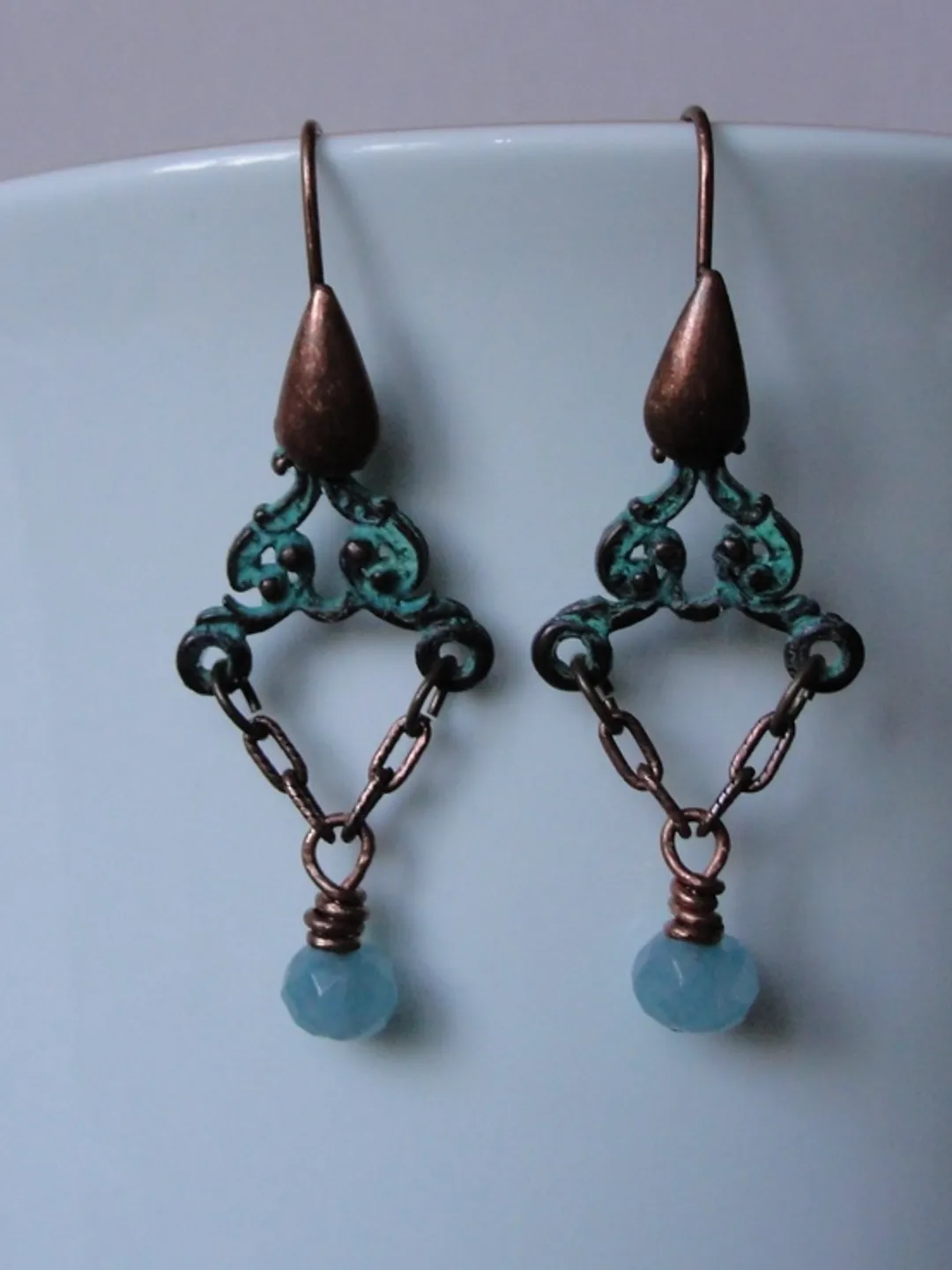 Boho Shabby chic Vintage style solid and natural copper earrings Textured patinated with a Aquamarine bead and chain