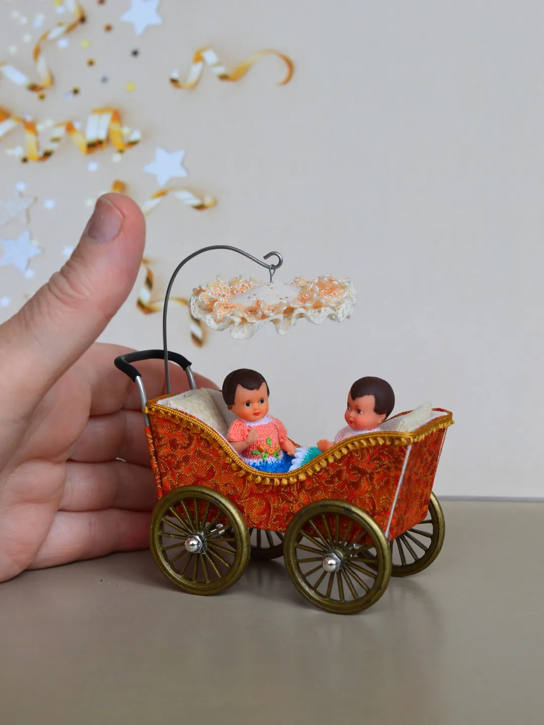 Miniature toy stroller for two small dolls. Handmade miniature stroller for small dolls.