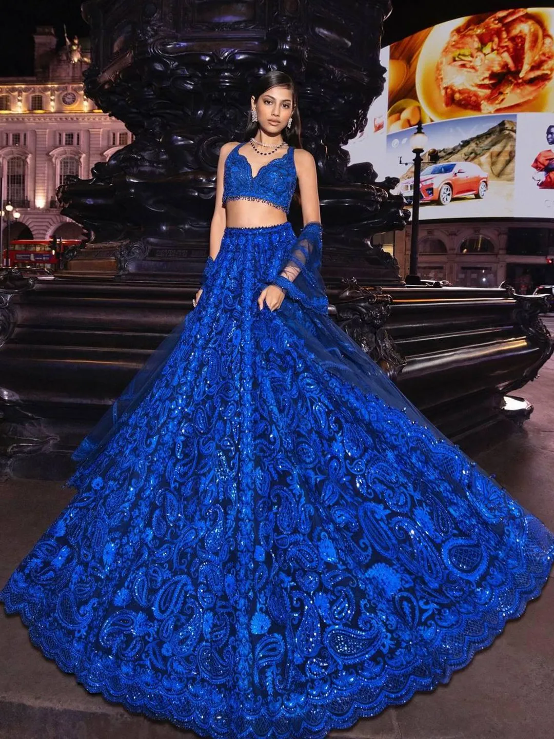 royal blue indian dress Drape yourself in the elegance of midnight with our Royal Blue Lehenga. Featuring an alluring deep blue hue and delicate silver-white embroidery, it's perfect for sangeet nights, receptions, or any moment that