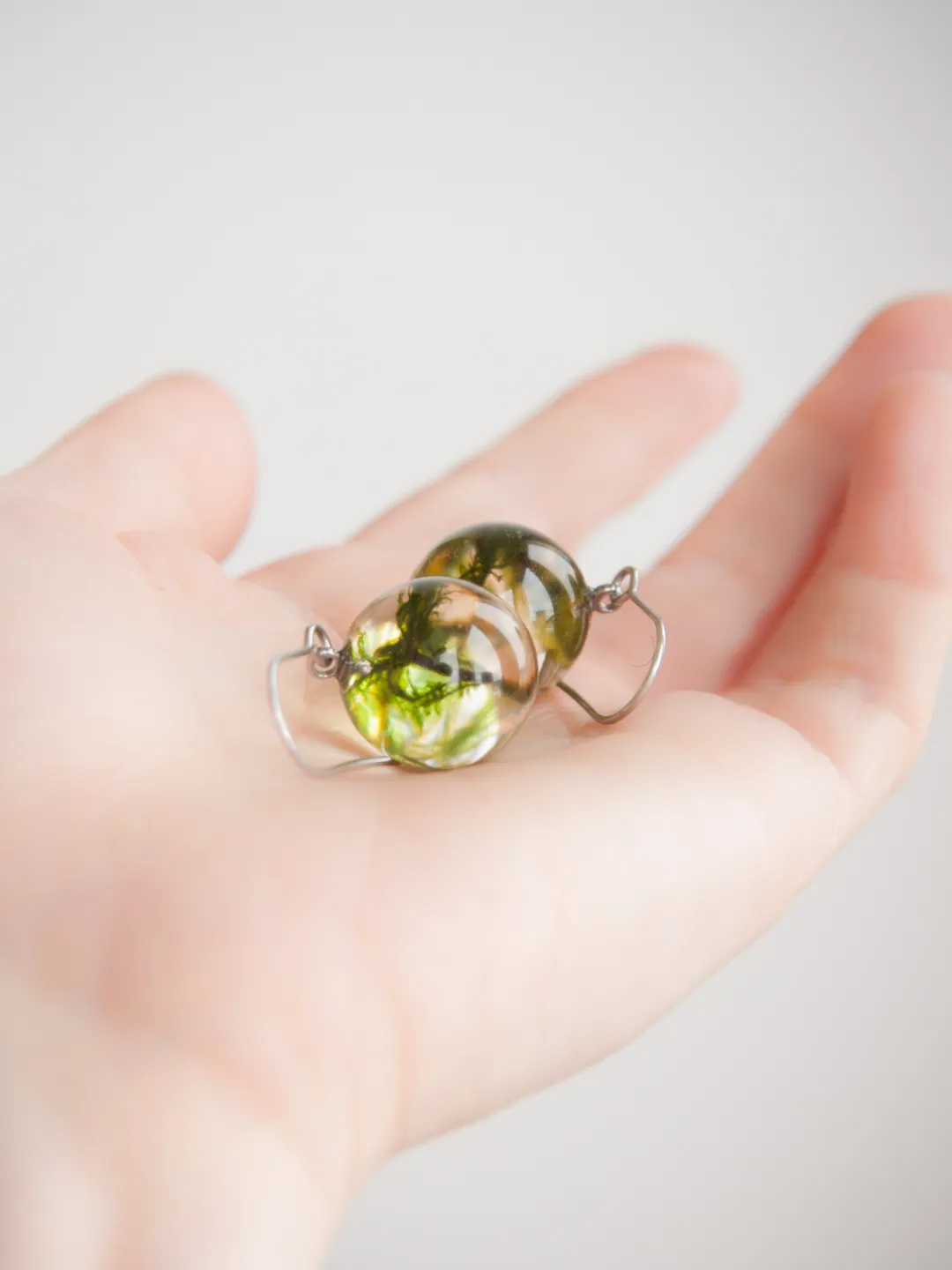 Moss sphere earrings. Dangle resin earrings