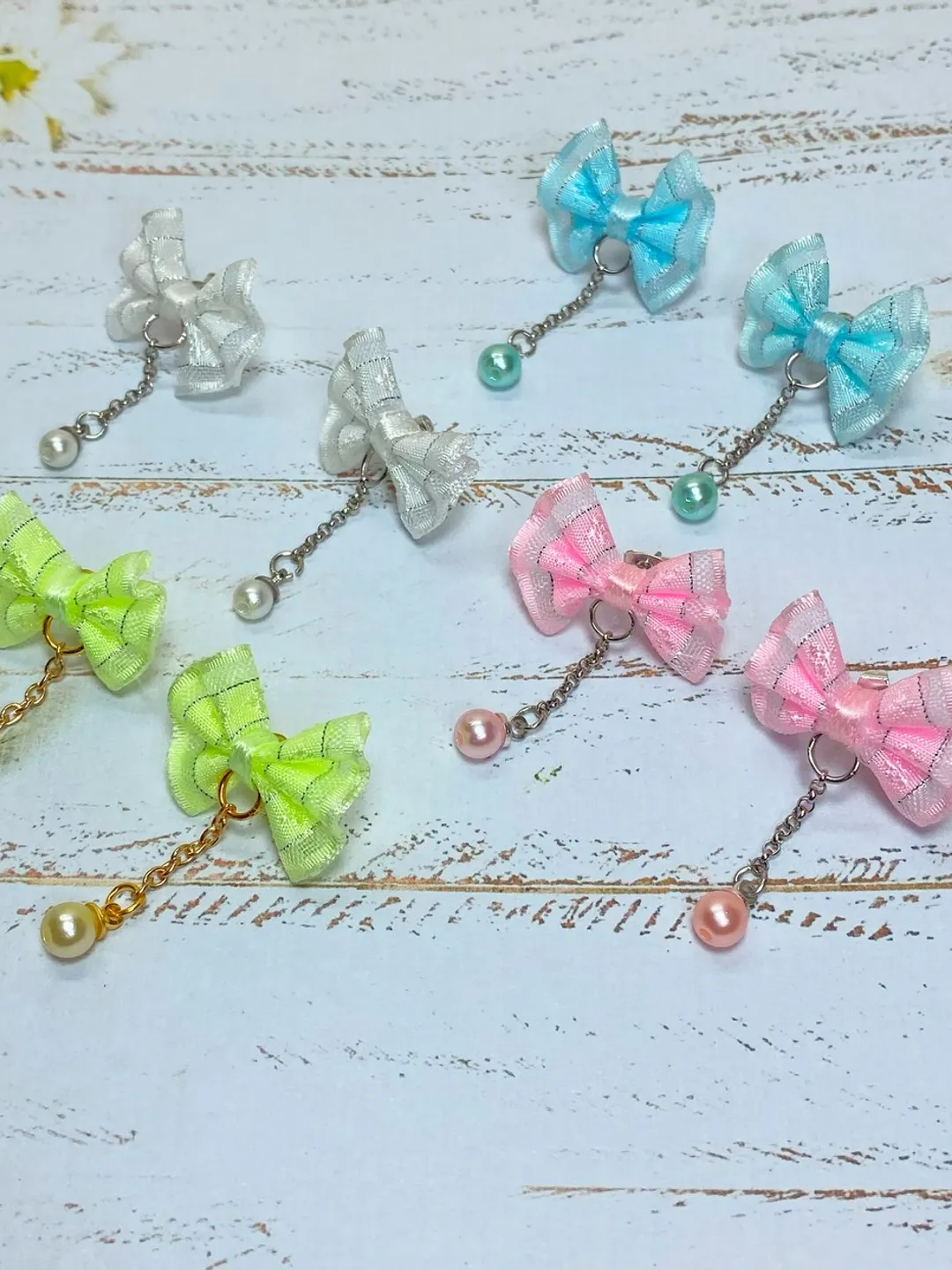 Handmade bow earrings. Author's work. Bright jewelry.
