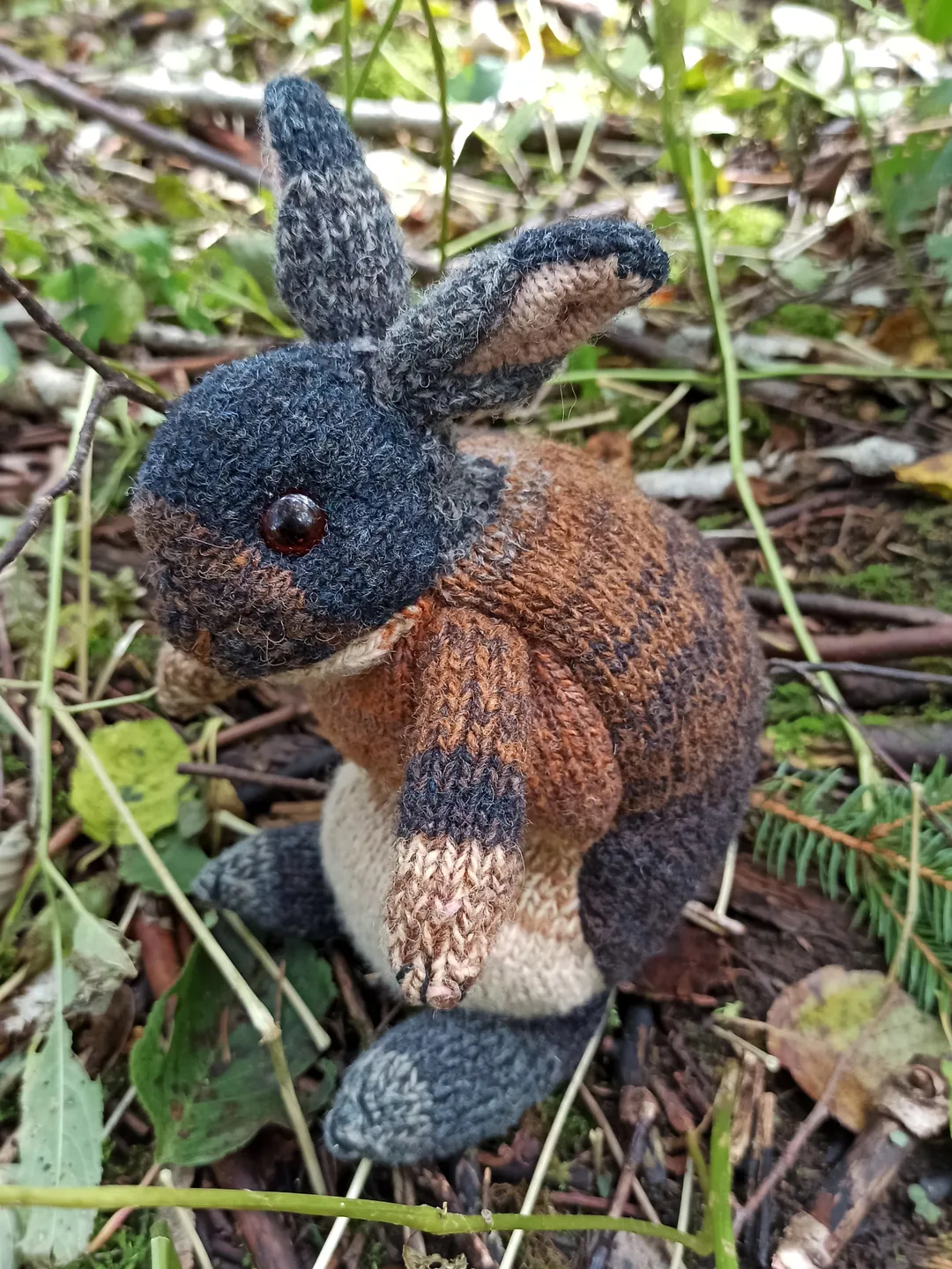 Realistic knitted bunny stuffed toy