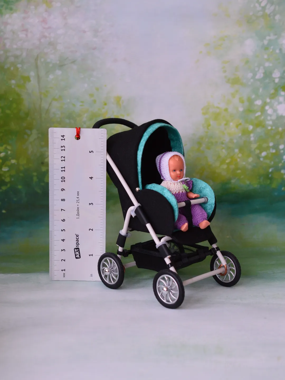 Miniature toy stroller for dolls in 1/6 scale. Accessories for small dolls and poupins. Pram for Barbie doll.