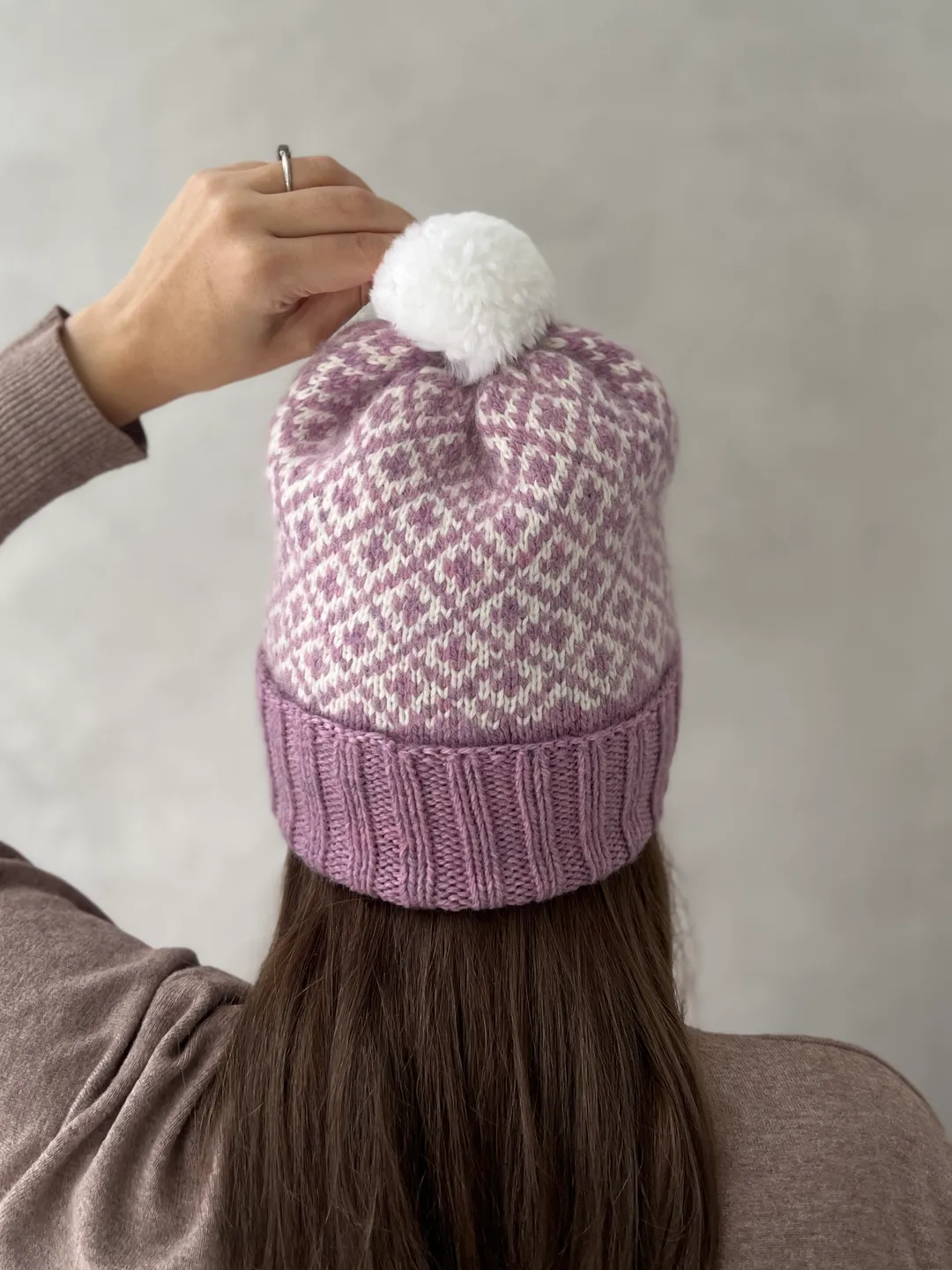 Warm womens hand-knitted hat