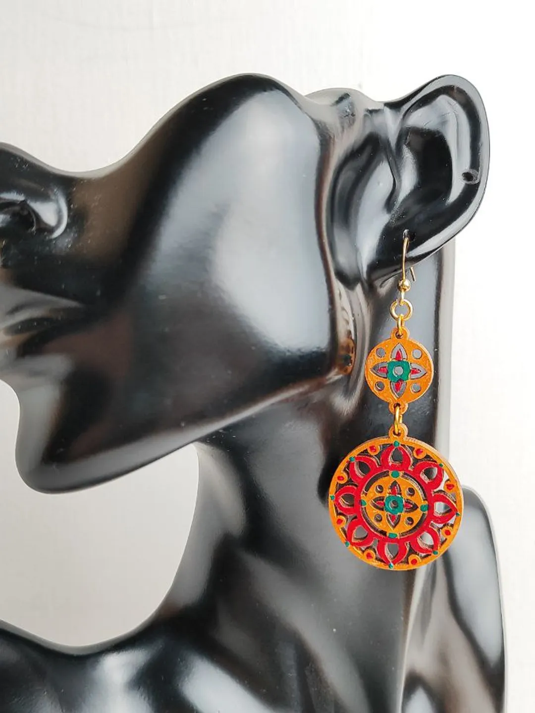 Bright ethnic earrings with hand painting