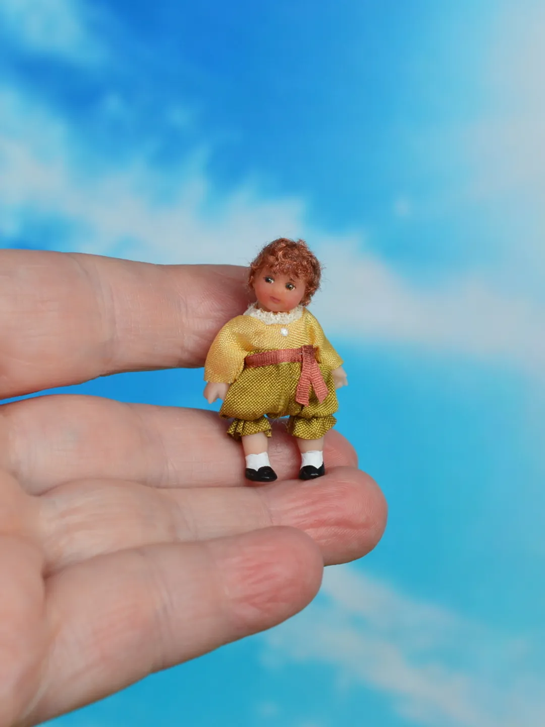 Miniature doll in 1/24 scale. Doll toy to doll house.