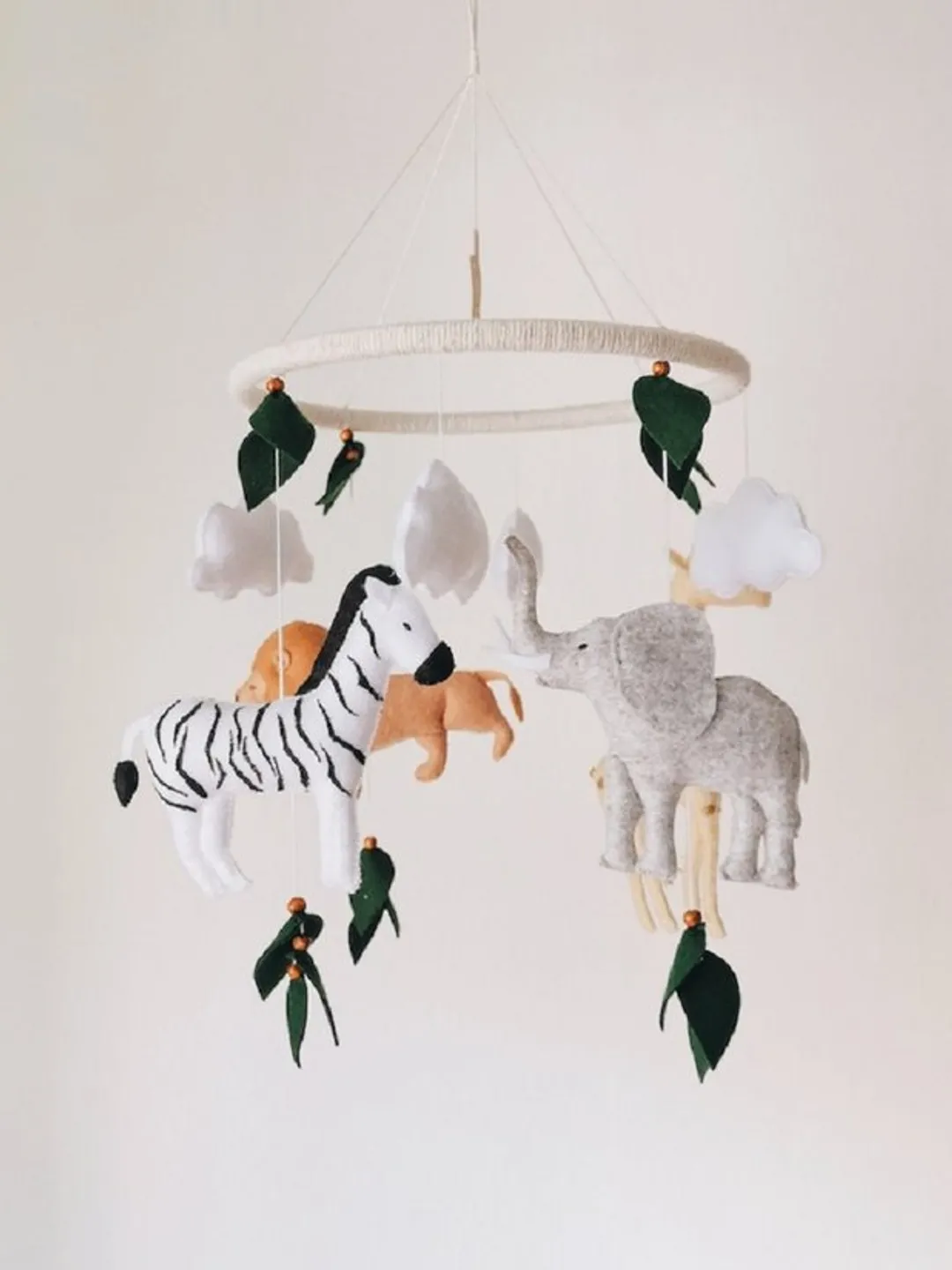 Safari mobile baby nursery decor crib