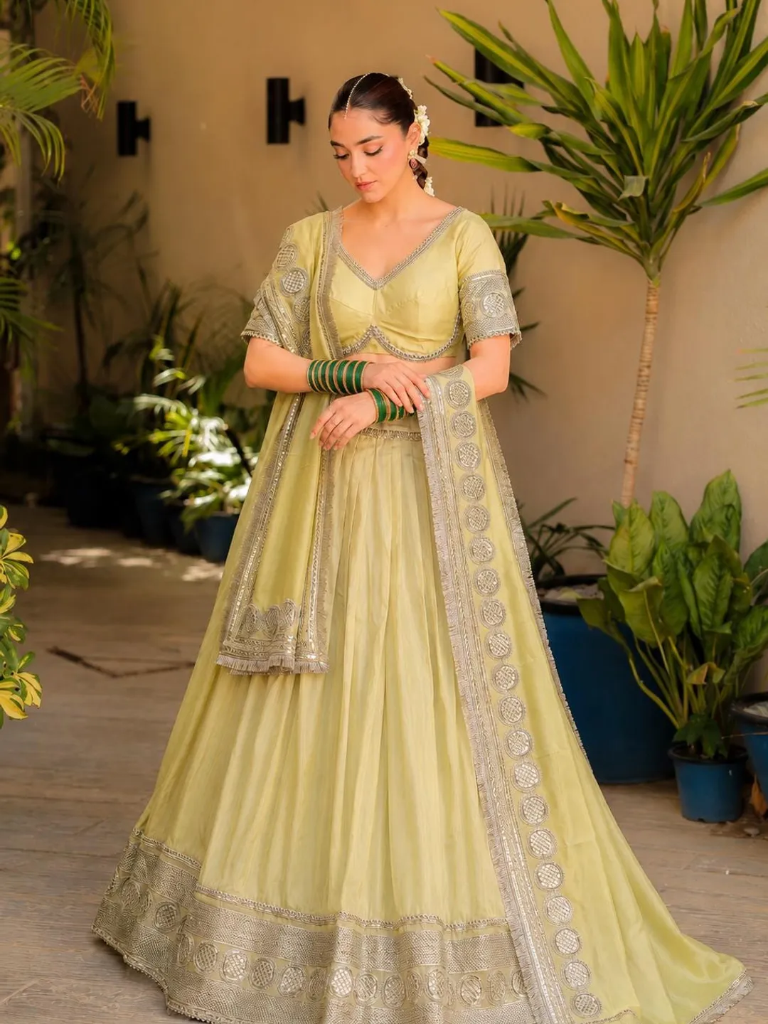 sage green pakistani wedding dress Sage green luxury, designed for Eid and wedding season., A heavily  embroidered Pakistani suit featuring intricate cutdana work across the  front, back and sleeves, paired with a fully embroidered silk