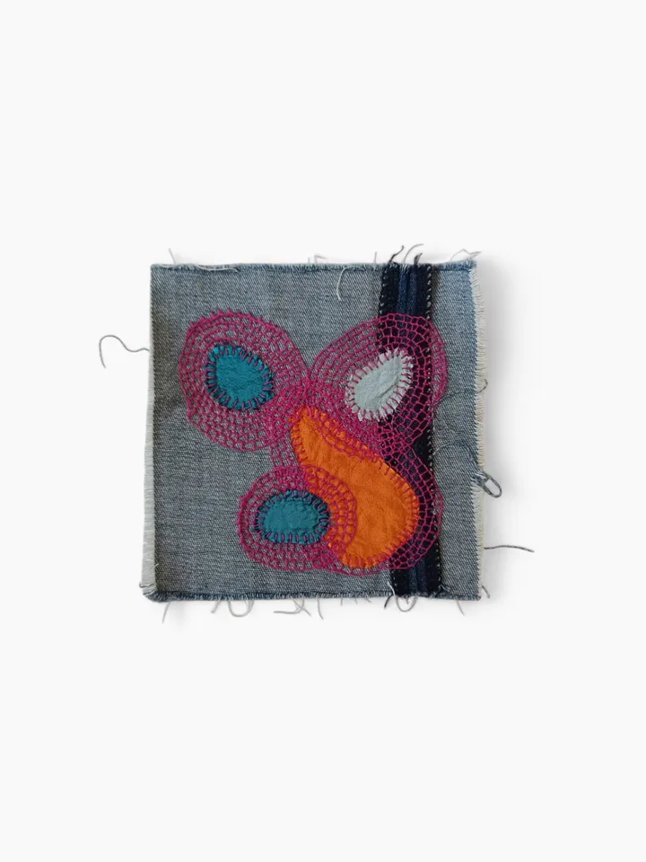 Upcycled denim boro patch. Sashiko stitching.