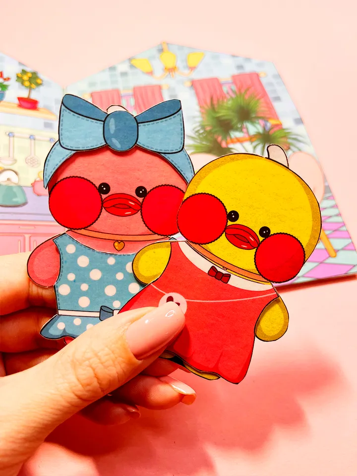 Paper ducks Lalafanfan with a house in album