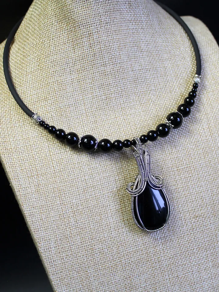 Handmade necklace made of natural stones. Wire wrapped stone pendant.