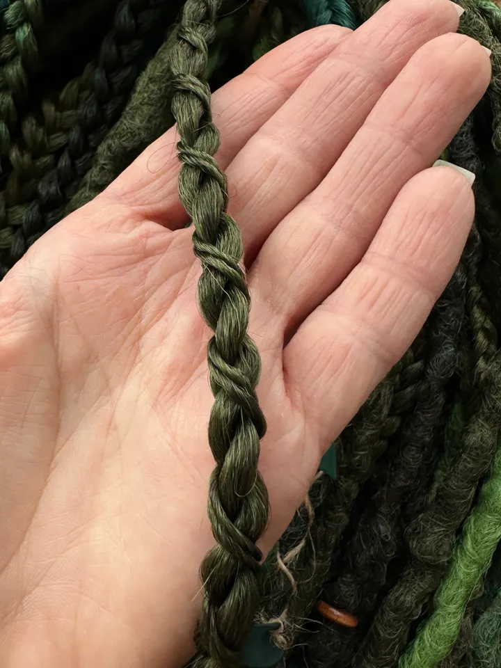 Dreads, green dreads and braids