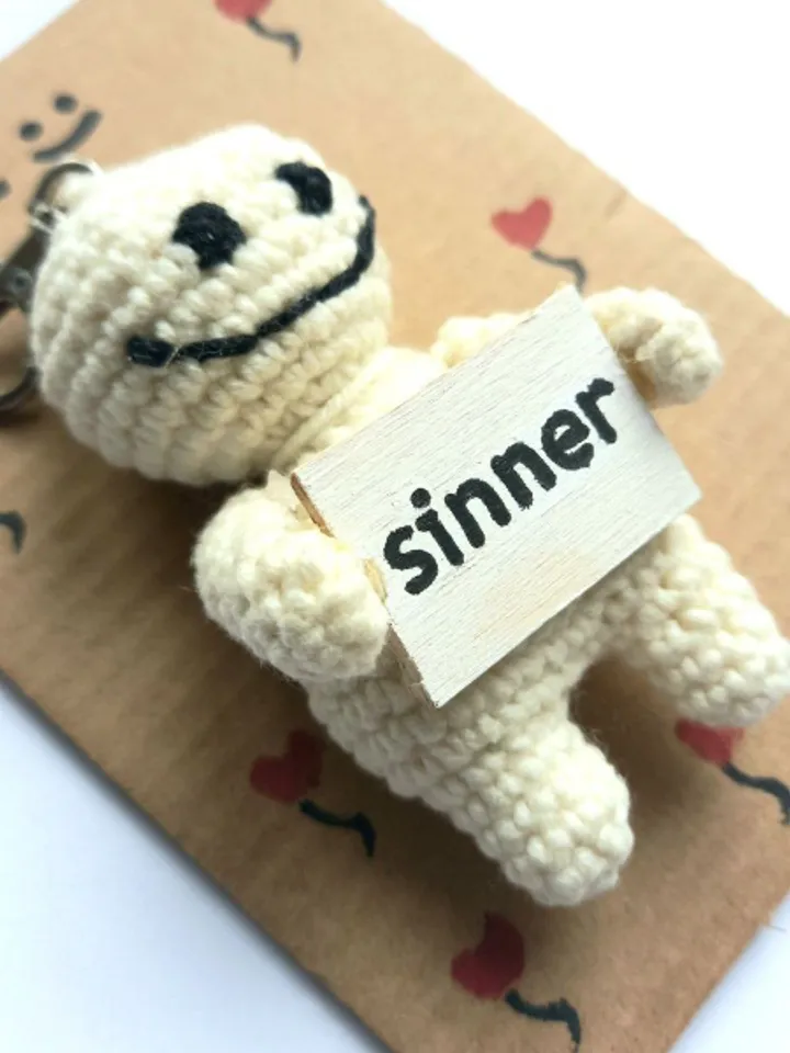 The keychain "sinner" for a bag or keys, a toy in the car interior, a pendant for the rearview mirror.