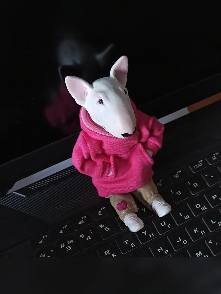 Bull Terrier doll in a pink sweater