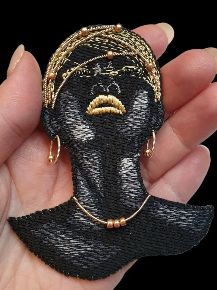 African woman machine embroidery design to create a brooch, keychain, pendant machine embroidery pattern woman motif