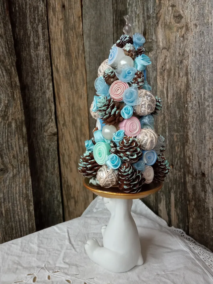 Fabulous handmade Christmas tree on a stand with a teddy bear
Xmas home decor indoor. Christmas ornament
