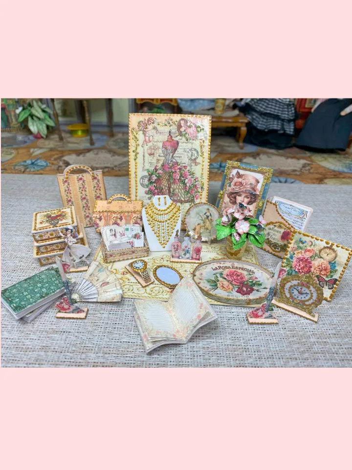 A set of accessories in beige and pink to fill the interior of a dollhouse in 1:12 scale.