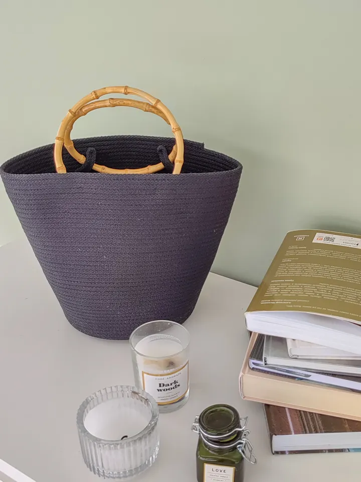 Small black bag with bamboo handles