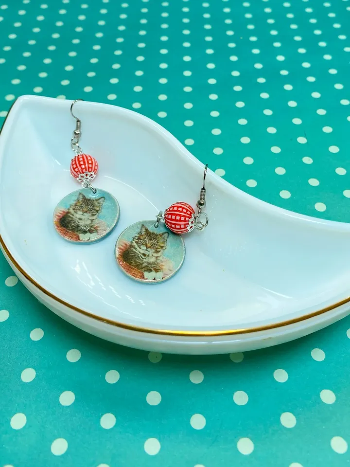 Handmade earrings. Earrings with beads. Handmade. Author's design. Earrings with images of cats.