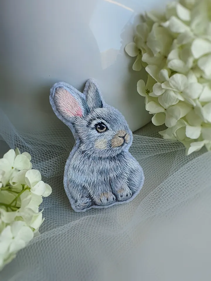 Tiny Bunny Brooch. An embroidered brooch in artistic satin stitch.