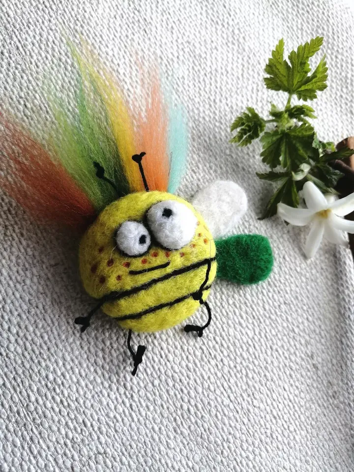 Women's original brooch in a handmade gift box. Sunny summer decoration for girls
