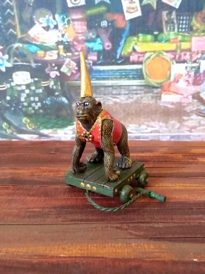 Monkey on a trolley. Wine toy for a doll.1:12 scale.