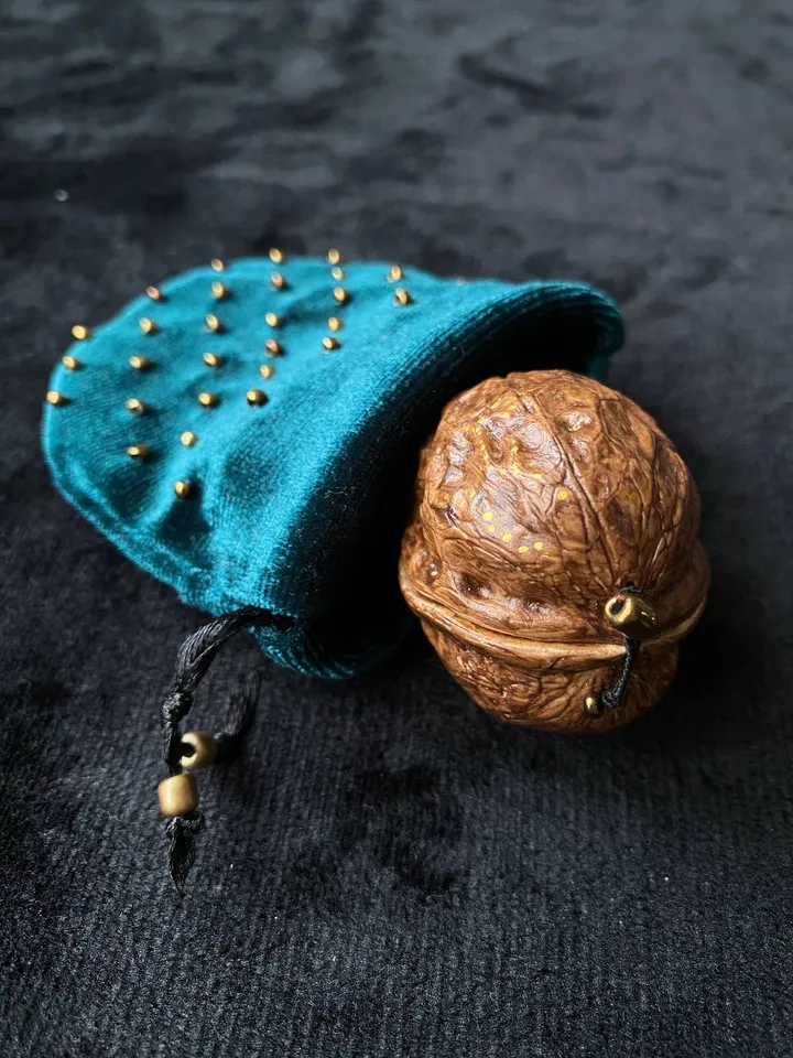 Green dragon eye brooch in walnut shell, green eye badge