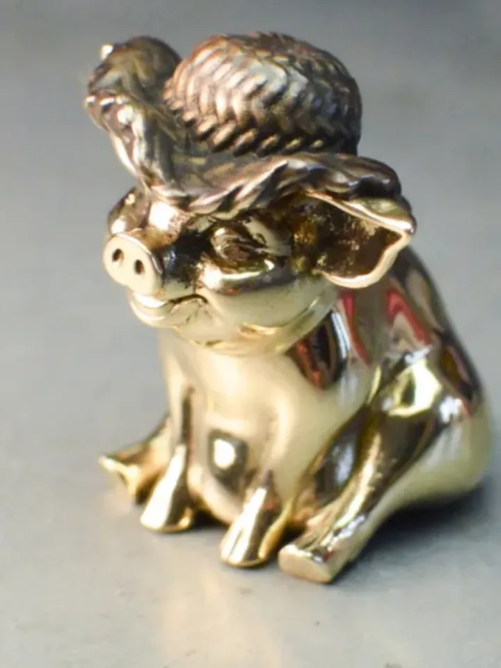 Charming pig in a hat