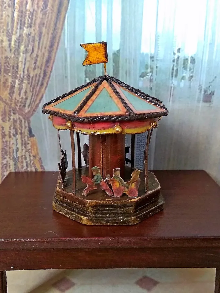 Miniature carousel. Dollhouse miniature.1:12 scale.