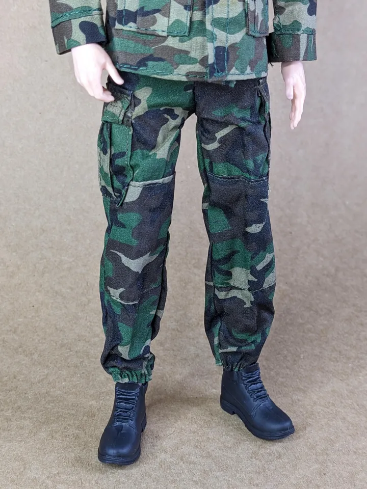 Military-style camo jacket, pants, and backpack for 12-inch fashion male dolls
