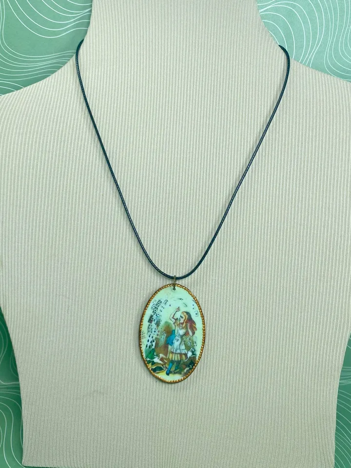 Handmade jewelry. Pendant in the style of "Alice".