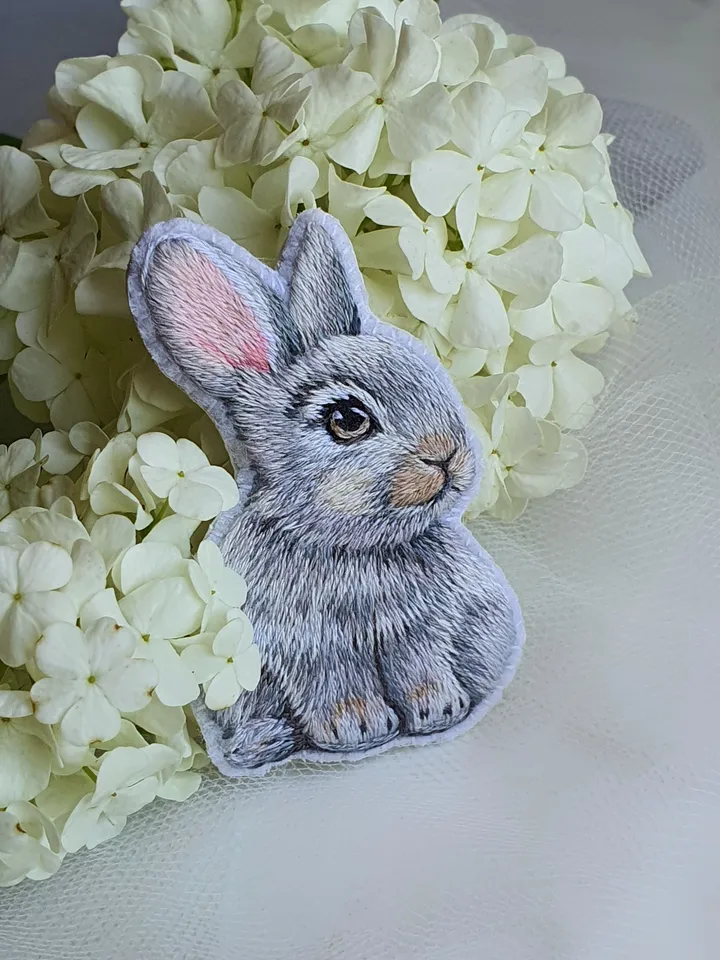 Tiny Bunny Brooch. An embroidered brooch in artistic satin stitch.