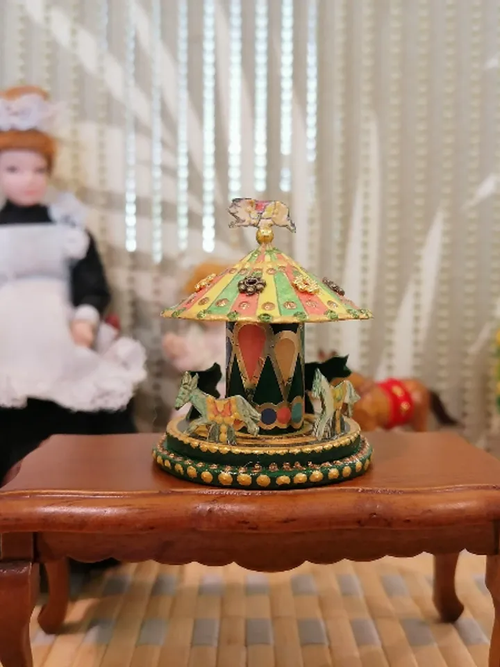 Miniature carousel. Dollhouse miniature.1:12 scale.