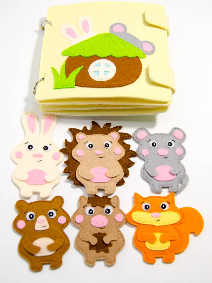 Quiet book with little houses and cute cubs