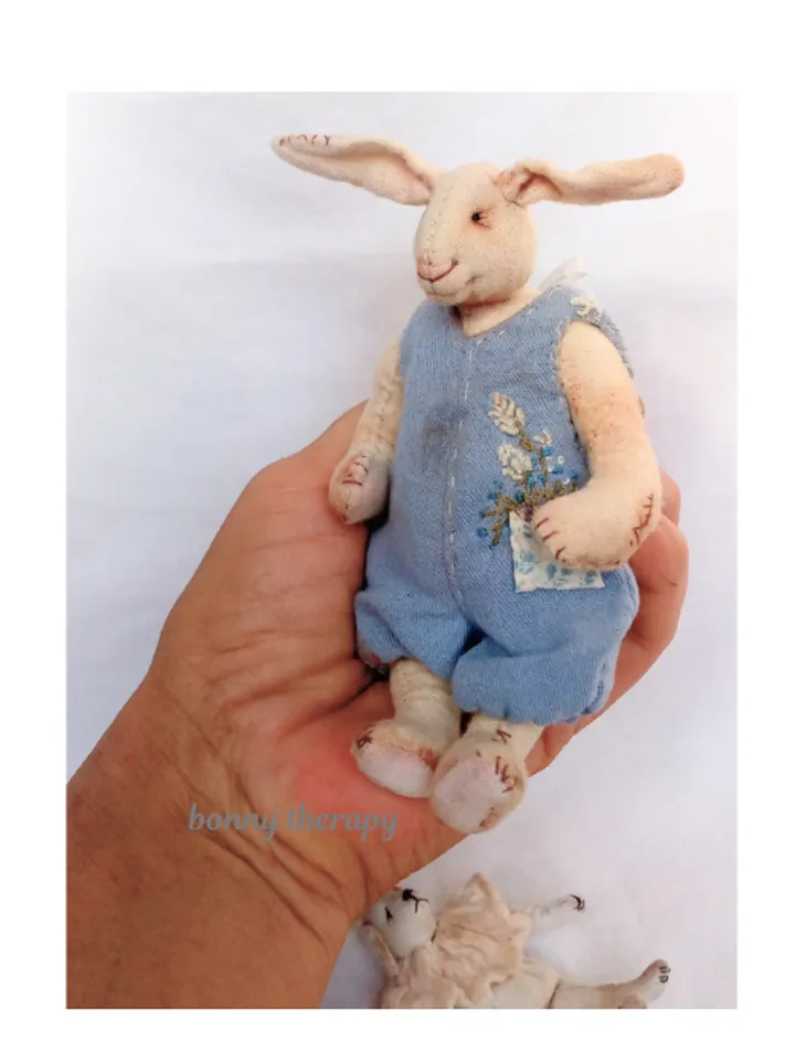 Textile bunny toy 5 inches height.