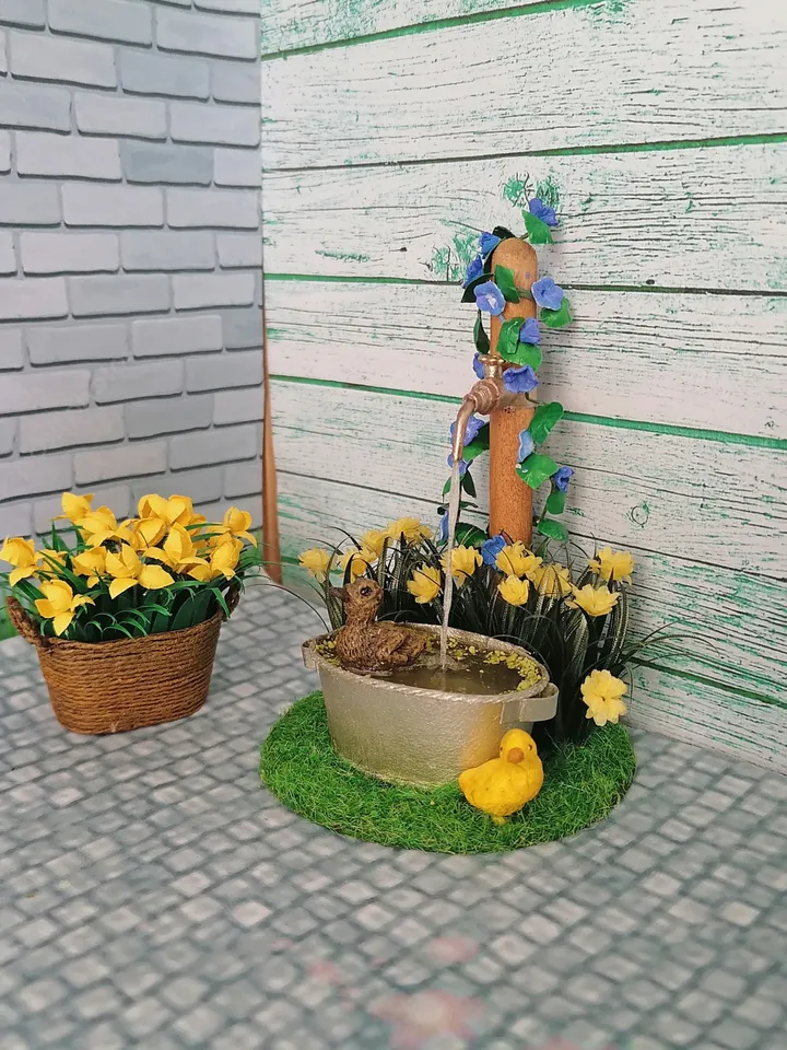 Composition for a puppet garden. Dollhouse miniature 1:12.