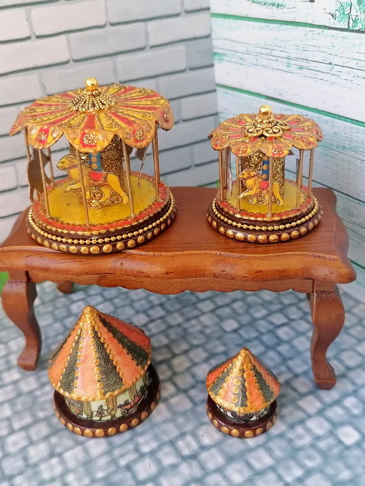 Miniature dollhouse carousel with gold trim. 1:12. Dollhouse miniature.