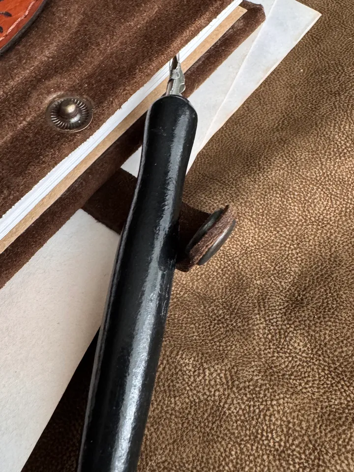 Notebook made of genuine suede with leather insert and wood engraving.