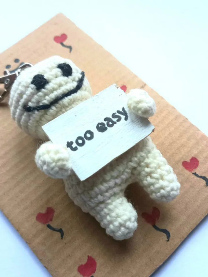 The keychain "too easy" for a bag or keys, a toy in the car interior, a pendant for the rearview mirror
