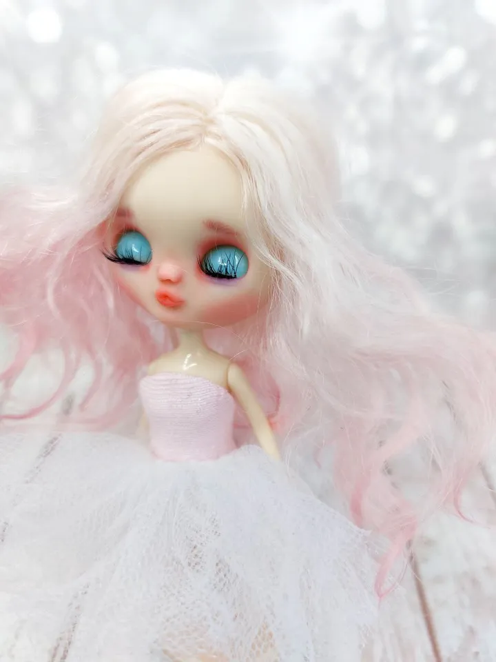 Petite Blythe doll with pink hair. Small doll with eye mechanism. Doll with a kiss.