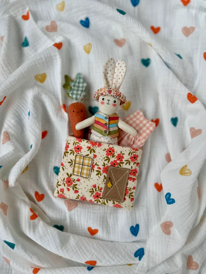 Sewing pattern hare with clothes and house