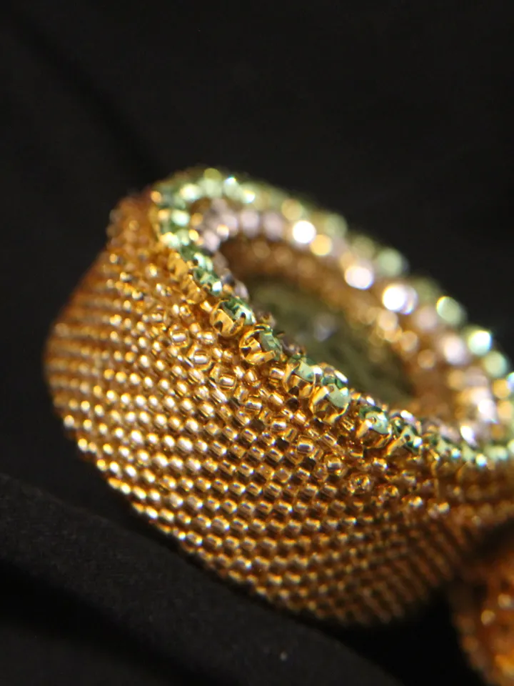 Pendant Japanese beads with a coil and rhinestones